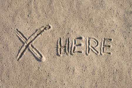 25452523-mysterious-sign-on-sand